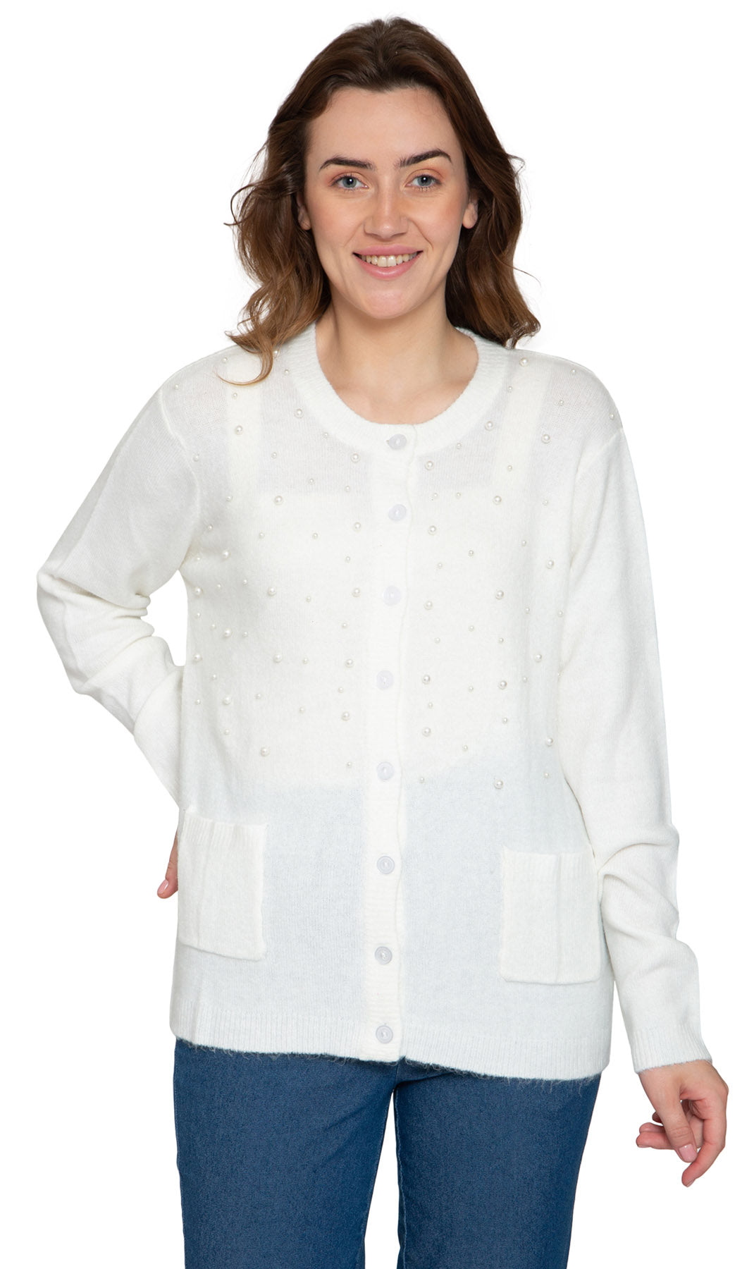 A woman wearing a purple cardigan with faux pearl accents on the front and pearl buttons. The cardigan has a crew neck and two front patch pockets.
