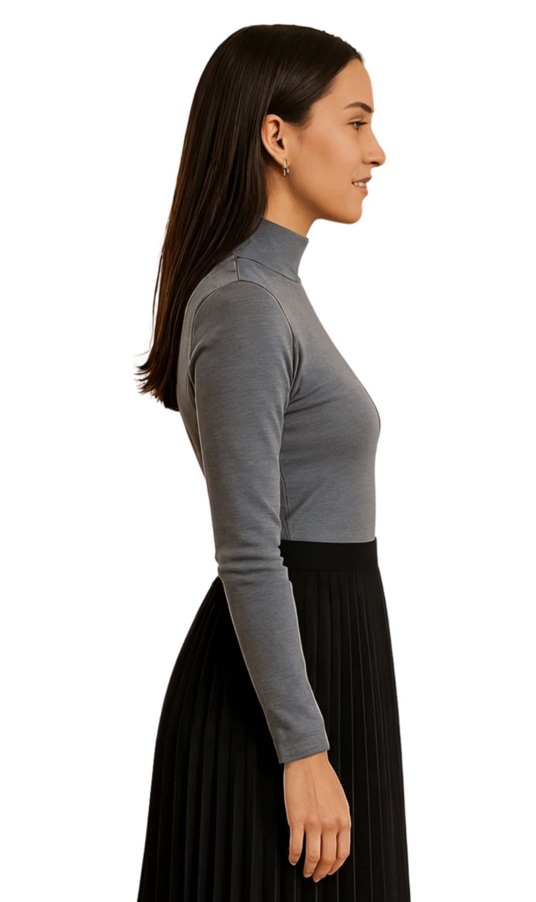 Woman wearing a gray long-sleeve top and black pleated skirt on a white background